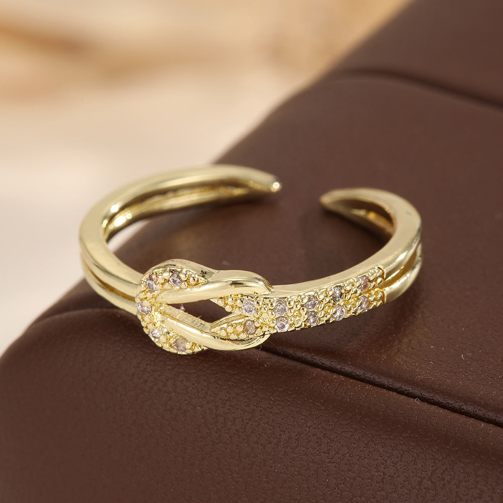 Ring Damen goldfarben mit Knotendesign und Glitzersteinen, elegant für besondere Anlässe - 3 - Marlena-atelier
