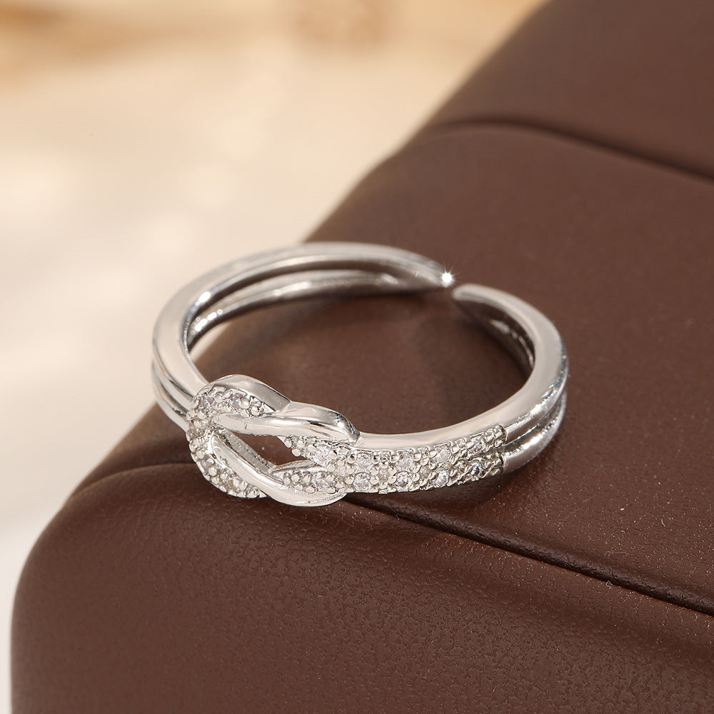 Ring Damen goldfarben mit Knotendesign und Glitzersteinen, elegant für besondere Anlässe - 5 - Marlena-atelier